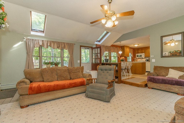 37 Sage Dr, Berlin, CT 06037 - living room featuring a baseboard heating unit, ceiling fan, plenty of natural light, vaulted ceiling, and light carpet