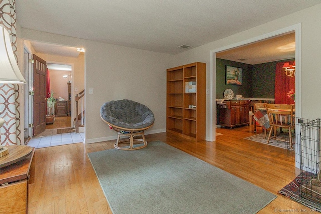37 Sage Dr, Berlin, CT 06037 - sitting room with wood finished floors and baseboards