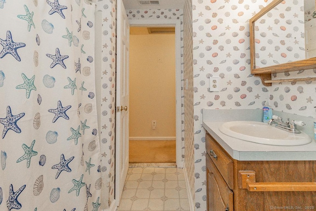 37 Sage Dr, Berlin, CT 06037 - bathroom with vanity and wallpapered walls