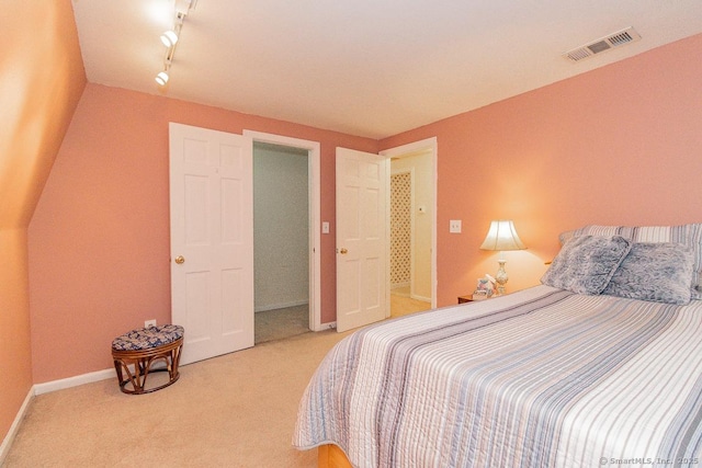 37 Sage Dr, Berlin, CT 06037 - carpeted bedroom with baseboards and rail lighting