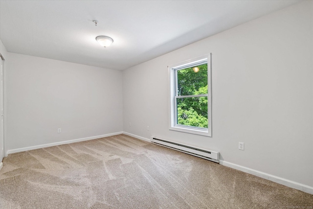 34 Pleasant St Unit 6, Plainfield, CT 06374 - empty room with a baseboard radiator, carpet, and baseboards