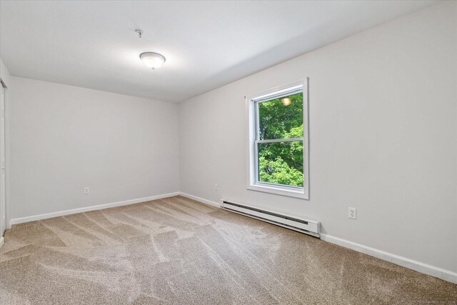 34 Pleasant St Unit 6, Plainfield, CT 06374 - spare room with a baseboard radiator, carpet, baseboards, and a pendent fire sprinkler