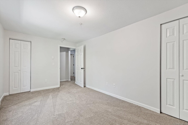 34 Pleasant St Unit 6, Plainfield, CT 06374 - unfurnished bedroom with carpet floors and baseboards
