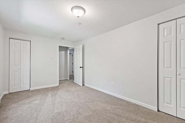 34 Pleasant St Unit 6, Plainfield, CT 06374 - unfurnished bedroom with carpet and baseboards