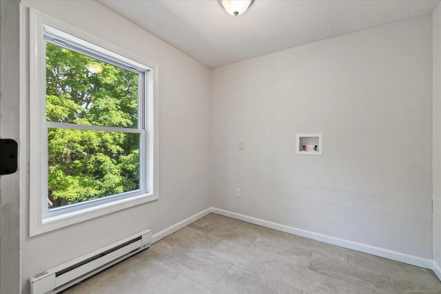 34 Pleasant St Unit 6, Plainfield, CT 06374 - unfurnished room with a baseboard heating unit and baseboards