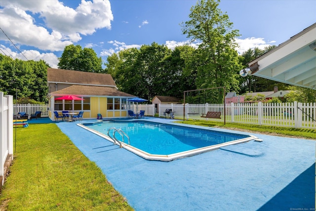 34 Pleasant St Unit 6, Plainfield, CT 06374 - view of swimming pool with a patio, an outdoor structure, and a storage structure