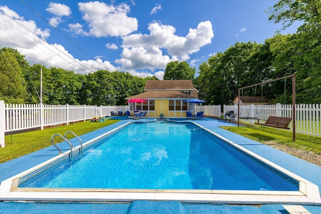 34 Pleasant St Unit 6, Plainfield, CT 06374 - view of swimming pool with an exterior structure, an outdoor structure, a patio, and view of scattered trees
