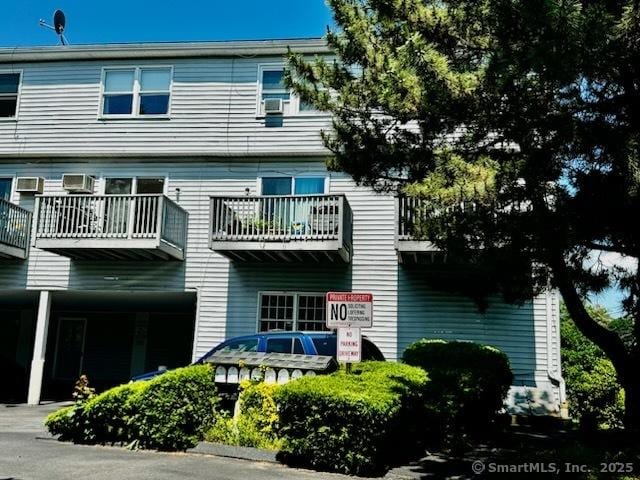 133 Main St Apt 4, Norwalk, CT 06851 - view of property with a wall mounted air conditioner