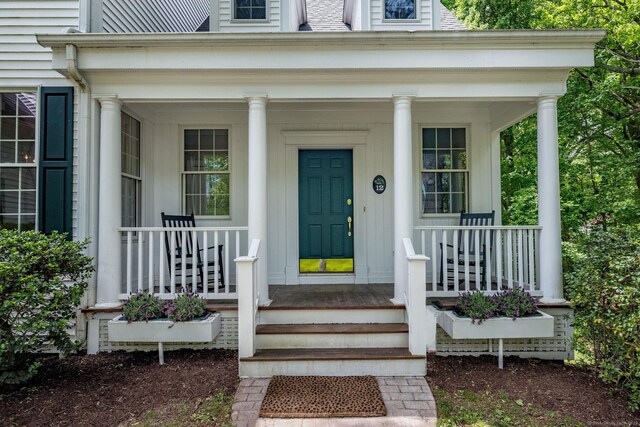 12 Stanton Ct, Madison, CT 06443 - entrance to property featuring covered porch