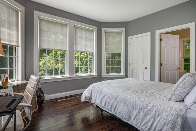 12 Stanton Ct, Madison, CT 06443 - bedroom with dark wood-style flooring and baseboards