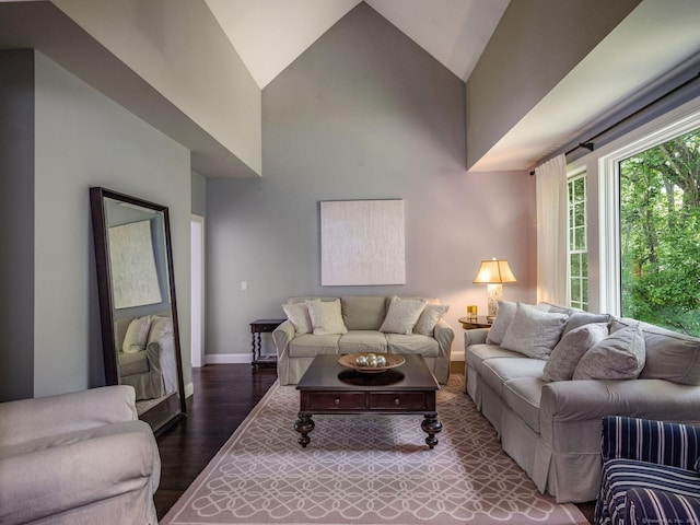 12 Stanton Ct, Madison, CT 06443 - living room with wood finished floors, high vaulted ceiling, and baseboards