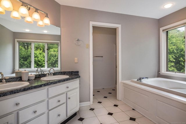 12 Stanton Ct, Madison, CT 06443 - full bathroom with double vanity, a bath, tile patterned floors, and baseboards