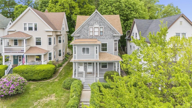 108 Highland Ave, Waterbury, CT 06708 - view of front of property with a porch, stairs, and a shingled roof