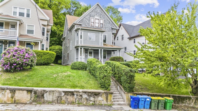 108 Highland Ave, Waterbury, CT 06708 - view of front of property with a front yard and stairs