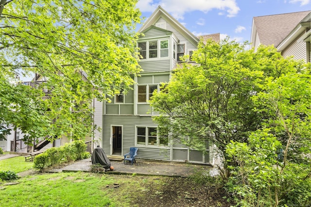 108 Highland Ave, Waterbury, CT 06708 - back of property featuring a patio