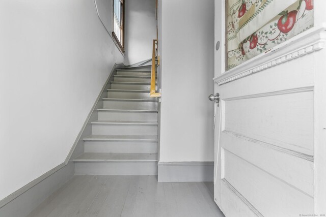 108 Highland Ave, Waterbury, CT 06708 - stairs featuring wood finished floors