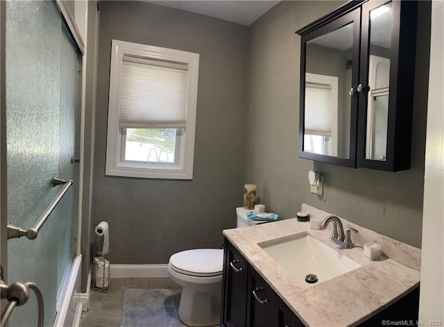 665 W Main St, West Haven, CT 06516 - bathroom featuring vanity, toilet, baseboards, shower / tub combination, and tile patterned floors