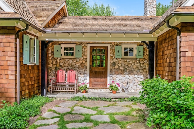 37 Salisbury Rd, Darien, CT 06820 - property entrance with a chimney and stone siding