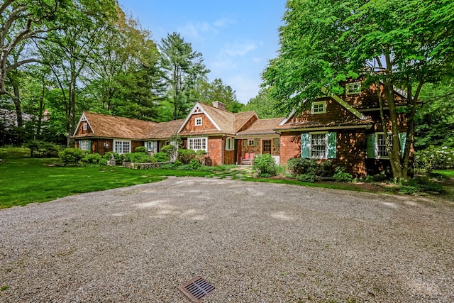 37 Salisbury Rd, Darien, CT 06820 - shingle-style home with a chimney, a front yard, and driveway