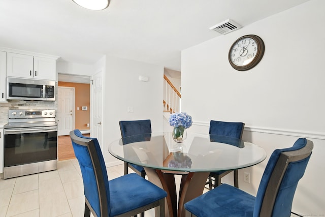 5 Crabapple Rd, Windsor, CT 06095 - dining room with stairs and light tile patterned flooring