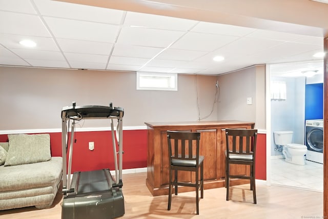 5 Crabapple Rd, Windsor, CT 06095 - workout area with washer / clothes dryer, a dry bar, light wood-style floors, baseboards, and a paneled ceiling