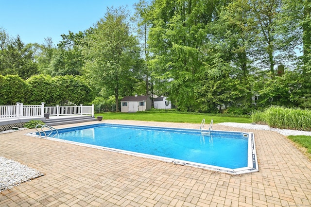 5 Crabapple Rd, Windsor, CT 06095 - outdoor pool featuring a patio, a lawn, view of scattered trees, and a wooden deck