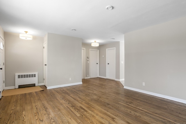 24 Manning St, New Fairfield, CT 06812 - spare room featuring radiator heating unit, baseboards, and wood finished floors