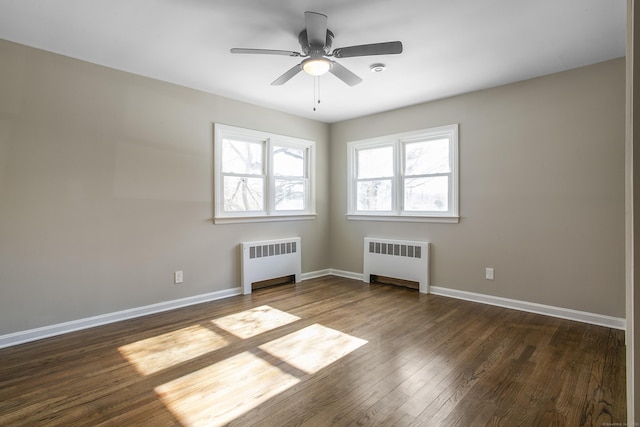 24 Manning St, New Fairfield, CT 06812 - unfurnished room featuring radiator, dark wood-type flooring, baseboards, and ceiling fan