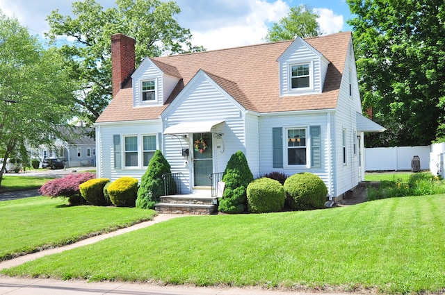 89 Bigelow St, Manchester, CT 06040 - cape cod-style house featuring a chimney and roof with shingles