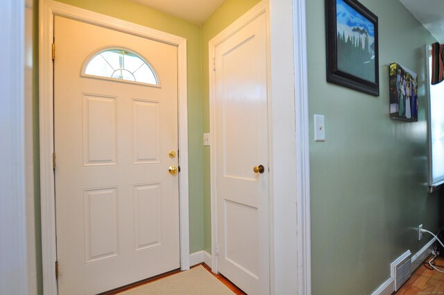 89 Bigelow St, Manchester, CT 06040 - foyer entrance featuring baseboards and wood finished floors