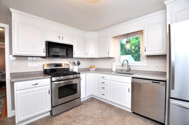 89 Bigelow St, Manchester, CT 06040 - kitchen with stainless steel appliances, a sink, white cabinets, backsplash, and crown molding