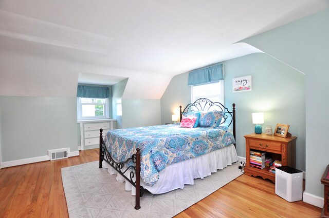 89 Bigelow St, Manchester, CT 06040 - bedroom featuring wood finished floors, lofted ceiling, and baseboards