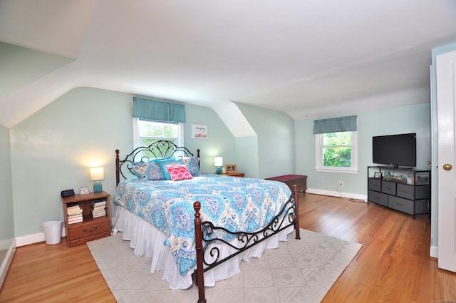 89 Bigelow St, Manchester, CT 06040 - bedroom featuring wood finished floors, multiple windows, lofted ceiling, and baseboards
