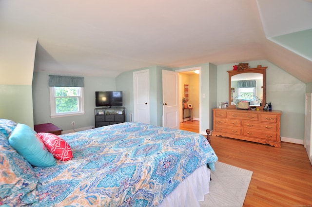 89 Bigelow St, Manchester, CT 06040 - bedroom featuring light wood-type flooring, baseboards, and vaulted ceiling