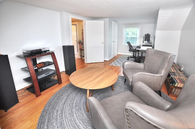 89 Bigelow St, Manchester, CT 06040 - living area with light wood-style flooring, an office area, and baseboards