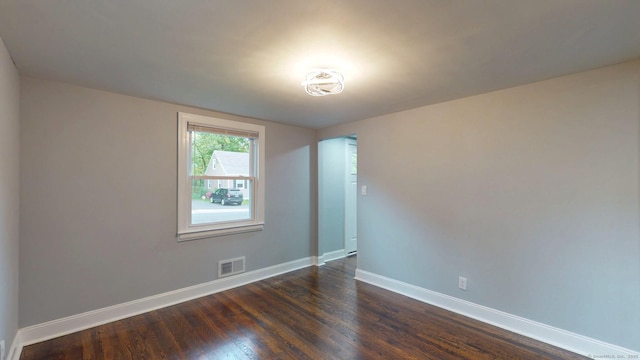 77 Hemlock St, Manchester, CT 06040 - spare room with baseboards and dark wood finished floors