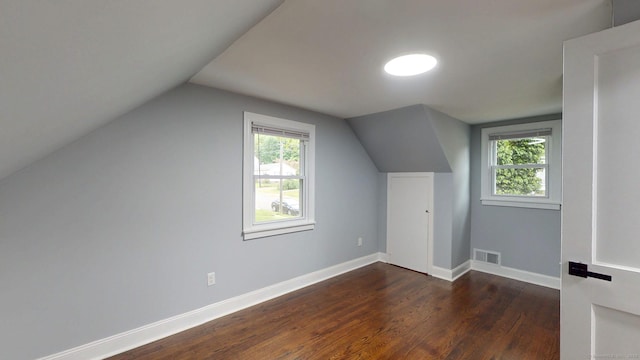 77 Hemlock St, Manchester, CT 06040 - bonus room with dark wood finished floors, lofted ceiling, and baseboards