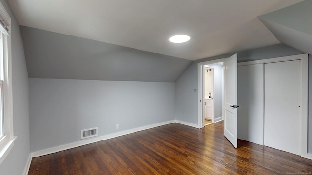 77 Hemlock St, Manchester, CT 06040 - bonus room with lofted ceiling, wood finished floors, and baseboards