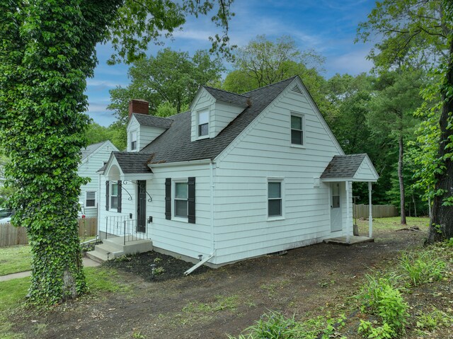 77 Hemlock St, Manchester, CT 06040 - view of front facade featuring a chimney and roof with shingles