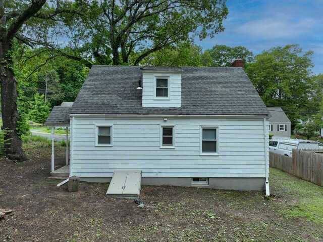 77 Hemlock St, Manchester, CT 06040 - rear view of house with a chimney and a shingled roof