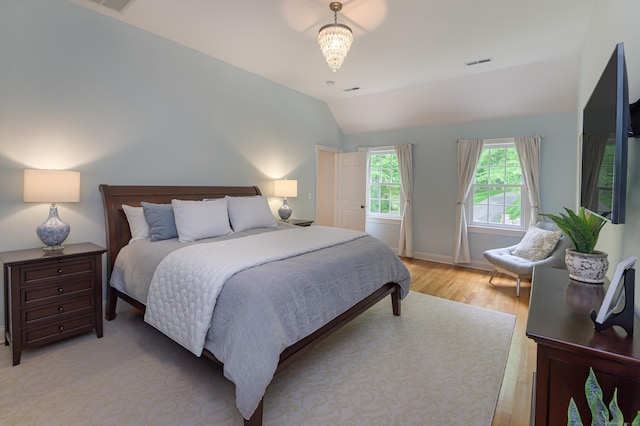 68 Topstone Rd, Ridgefield, CT 06877 - bedroom with vaulted ceiling, light wood finished floors, and baseboards