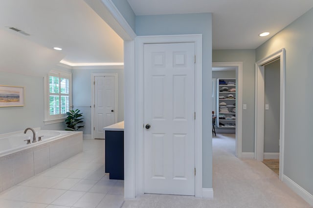 68 Topstone Rd, Ridgefield, CT 06877 - full bathroom featuring a bath, vanity, recessed lighting, baseboards, and a walk in closet
