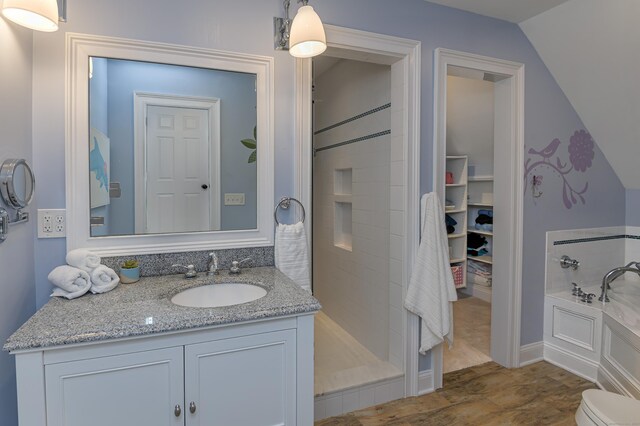 68 Topstone Rd, Ridgefield, CT 06877 - full bathroom with a shower stall, vanity, a bath, wood finished floors, and toilet