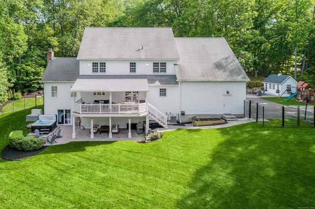 68 Topstone Rd, Ridgefield, CT 06877 - back of house featuring a patio area, a deck, a chimney, a playground, and roof with shingles