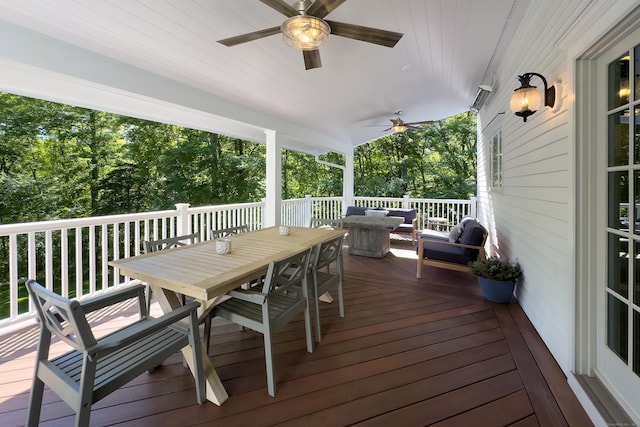 68 Topstone Rd, Ridgefield, CT 06877 - wooden terrace featuring outdoor dining space, an outdoor hangout area, ceiling fan, and view of wooded area