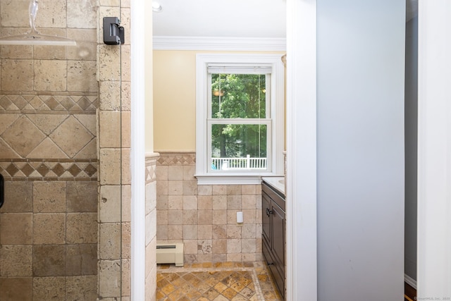 10 Cartier Rd, Enfield, CT 06082 - full bath featuring vanity, a baseboard radiator, a tile shower, crown molding, and tile walls