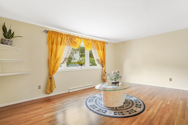 15 Amherst Pl, Stamford, CT 06902 - unfurnished room with a baseboard radiator, wood finished floors, and baseboards