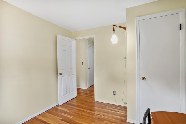 15 Amherst Pl, Stamford, CT 06902 - unfurnished bedroom with light wood-type flooring and baseboards