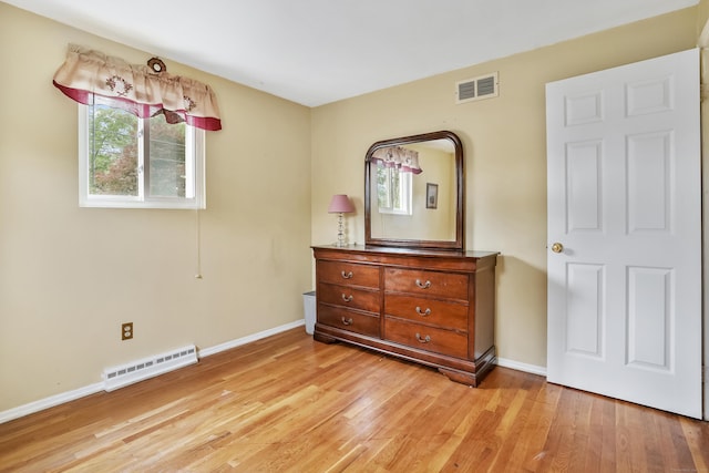 15 Amherst Pl, Stamford, CT 06902 - bedroom with light wood finished floors and baseboards