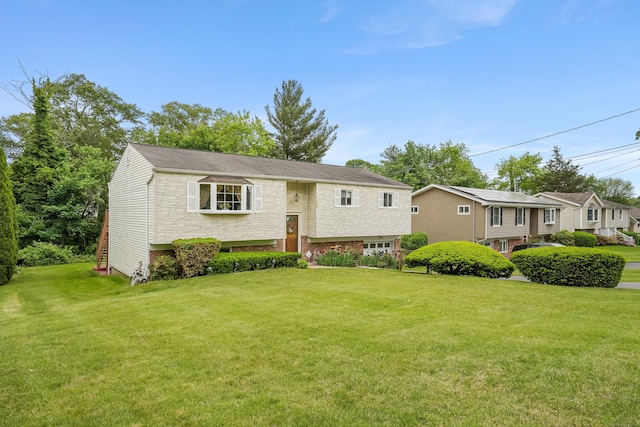 15 Amherst Pl, Stamford, CT 06902 - split foyer home featuring a front lawn